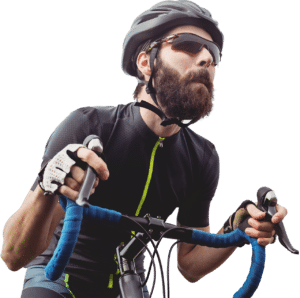 Cykelrytter på hometrainer cykel.